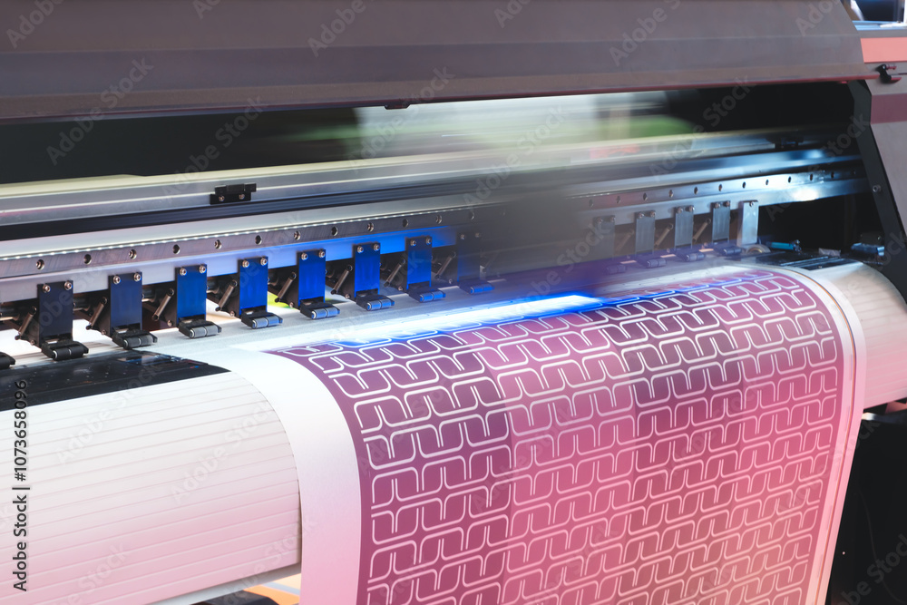 Poster A printer is printing a colorful design on a piece of paper. The design features a series of squares and circles, with some of the squares being larger than the others