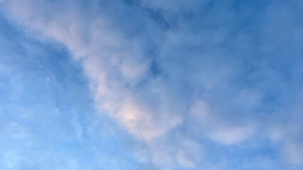 Blue and Pink Sky with Dark Cumulus Clouds, Soft Gradient and Dramatic Evening Light, Top View