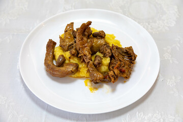 Traditional and rustic Brazilian dish, free-range chicken with polenta. Real food