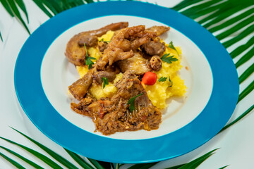 Traditional and rustic Brazilian dish, free-range chicken with polenta. Real food