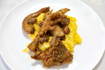 Traditional and rustic Brazilian dish, free-range chicken with polenta. Real food
