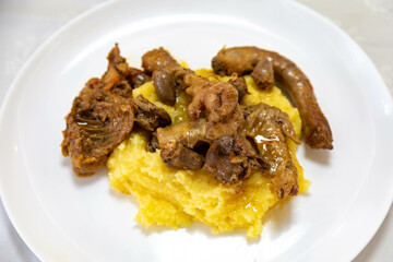 Traditional and rustic Brazilian dish, free-range chicken with polenta. Real food