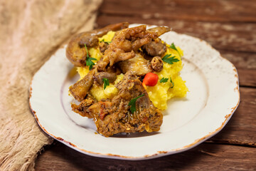 Traditional and rustic Brazilian dish, free-range chicken with polenta. Real food