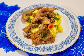 Traditional and rustic Brazilian dish, free-range chicken with polenta. Real food