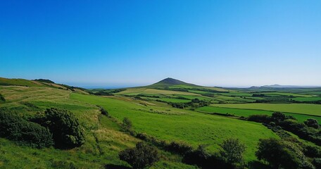 Fototapeta premium Panoramic Irish Countryside with Lush Green Fields