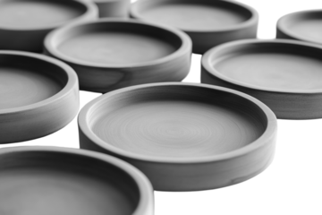 Heart-shaped white plate with gold-handled cutlery, isolated on a pink background. PNG transparent.