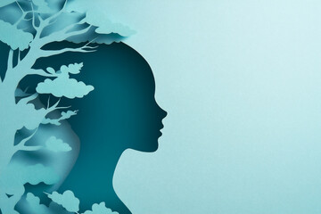 Open mind and Good Mental health. Paper cut illustration with human silhouette and space for text. Cut out composition with woman and colorful branches of tree on head in blue backdrop. 