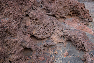 solidified volcanic lava texture, natural abstraction, red volcanic rock, volcanic background