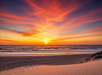  View of epic sunset over a tropical beach with stunning sky colours
