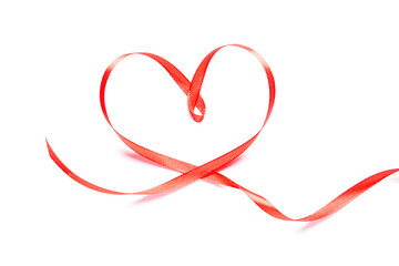 Red heart-shaped ribbon on a white background