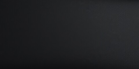 Black leather fabric with a sleek and smooth texture, perfect for backgrounds or design elements, material