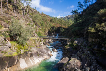 Peneda Geres National Park Portugal. Tahiti waterfalls. Scenic landscape , wild river. Its rugged hills are home to deer, wolves and golden eagles. The trails include a Roman road with landmarks.