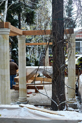 construction process of pergola pergola with columns and wooden beams
