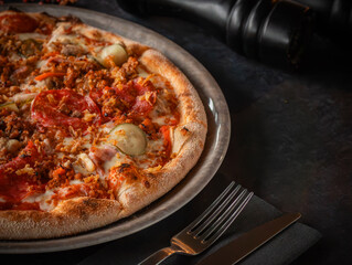 Close-up of a pizza with various toppings