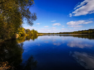 Fototapeta premium autumn landscape with lake