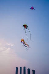 Kids Flying Kites Under a Clear Sky Peaceful and Joyful Outdoor Scene. High quality photo