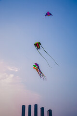 Kids Flying Kites Under a Clear Sky Peaceful and Joyful Outdoor Scene. High quality photo