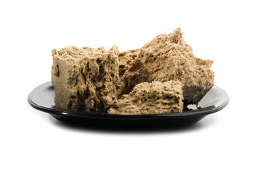 Pieces of halva on a saucer