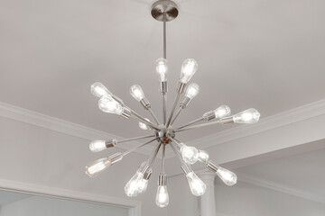Unique Chrome Chandelier Design With Vivid Lighting