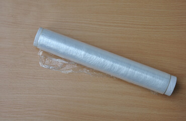 roll of cling film for wrapping food on table