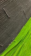 Vivid green and textured gray abstract painting, perfect for dynamic visual impact in modern design...