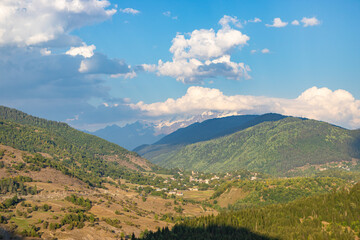 Beautiful Svaneti landscape with forest and mountains near Mestia in Summer. Upper Svaneti region, Georgia.