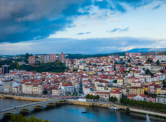 Obraz premium Aerial view of Coimbra city old town on the hill. Panoramic drone cityscape and Mondego River, Portugal