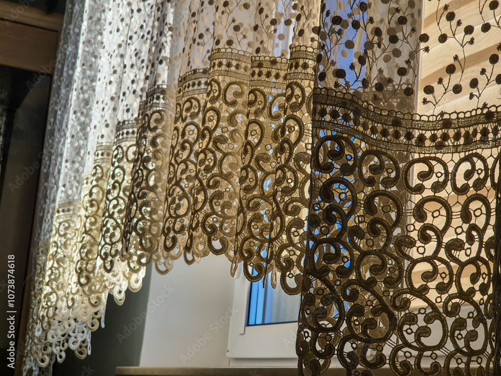 Poster elegant lace curtain with intricate patterns, softly illuminated by natural light through a window, 