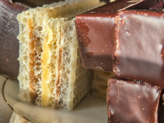 Delicious assortment of chocolate and wafer desserts on a plate. Perfect for sweet tooth cravings...