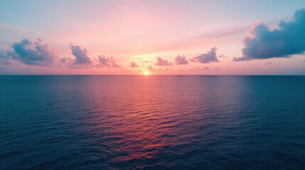 Obraz premium stunning sunset over calm ocean, with vibrant colors in sky