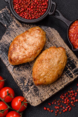 Delicious fresh fried minced fish cutlets with spices and herbs