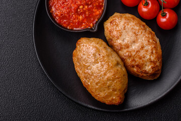 Delicious fresh fried minced fish cutlets with spices and herbs