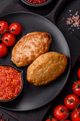 Delicious fresh fried minced fish cutlets with spices and herbs