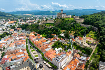 Fototapeta premium City and Castle in Trenčín, Slovakia - Aerial View of Historic Landscape