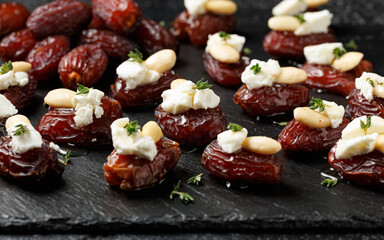 Stuffed Medjool dates with goat cheese, almonds and honey