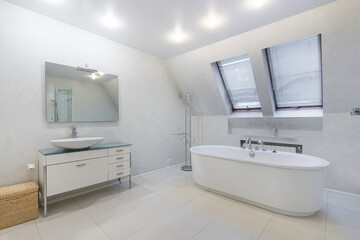 Bathroom interior with modern design. Windows with blinds, stylish accessories.