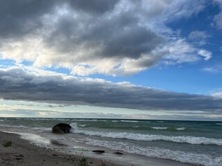 Coastal view with waves crashing against the shore