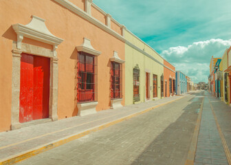 Fototapeta premium Colorful Mexican Street with Vibrant Houses in Colonial Style