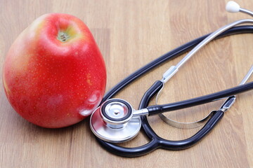 Apple as a symbol of taking care of your health, regular check-ups and taking care of yourself 
and your health.