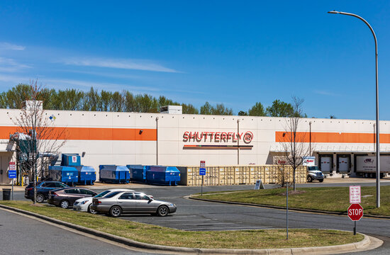 FORT MILL, S.C.-2 APRIL 22: Shutterfly, Inc., building with loading docks, parking lot and sign.