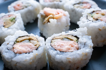 sushi on black plate