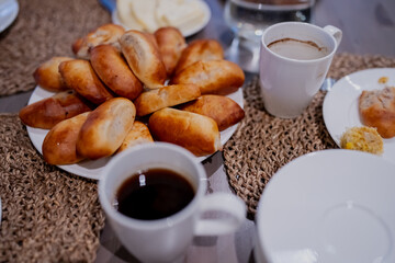 Hot coffee and traditional latvia winter time pastry called 