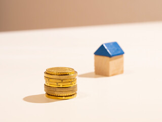 real estate property value concept stack of coins with house