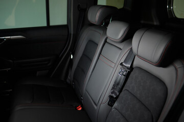 Car back seat with headrest and arm rest, a comfortable automotive fixture
