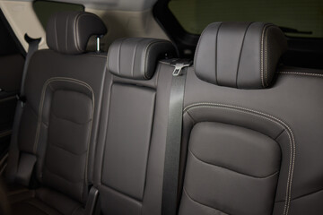 Car back seat with headrest and arm rest, a comfortable automotive fixture