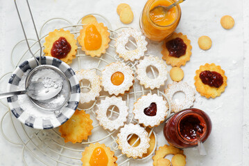 Traditional Christmas Linzer Cookies on a Christmas rustic background