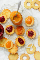 Traditional Christmas Linzer Cookies on a Christmas rustic background