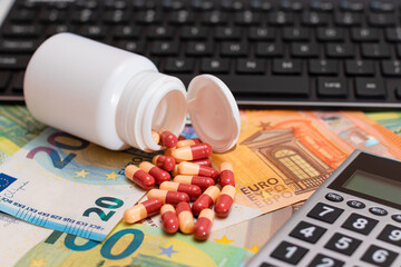 Ordering Medicines. Expensive Medicine and Inflation Concept: Pills and Capsules on the Euro Banknotes. Global Pharmaceutical Industry and Big Pharma. Trade in Medicines
