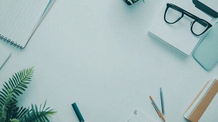 Stationery items arranged neatly on a plain surface