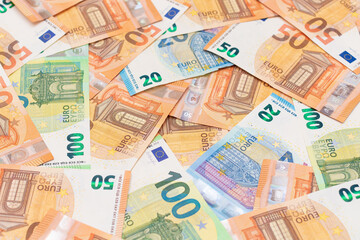 Different Euro Banknotes Money Background. Euro Money Currency. Colored Paper Money. A Lot of Fifty Euro Bills. Business, Finances, Cash and Money Saving Concept